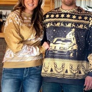 Pair of his and hers Christmas sweatshirts